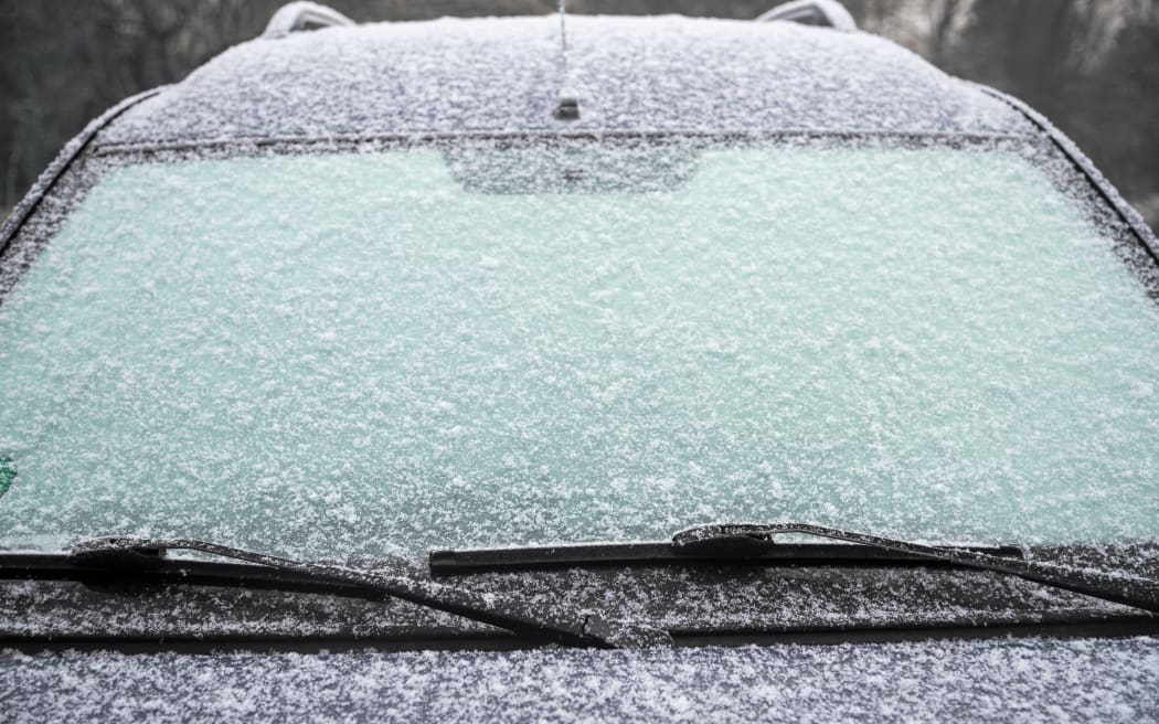 Step-by-step guide on how to remove ice from a windshield